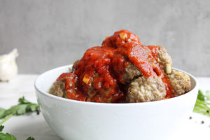 Homemade Meatballs with Spaghetti side view in a bowl