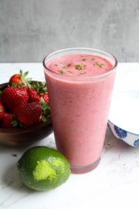 Recipe for strawberry smoothie in tall glass