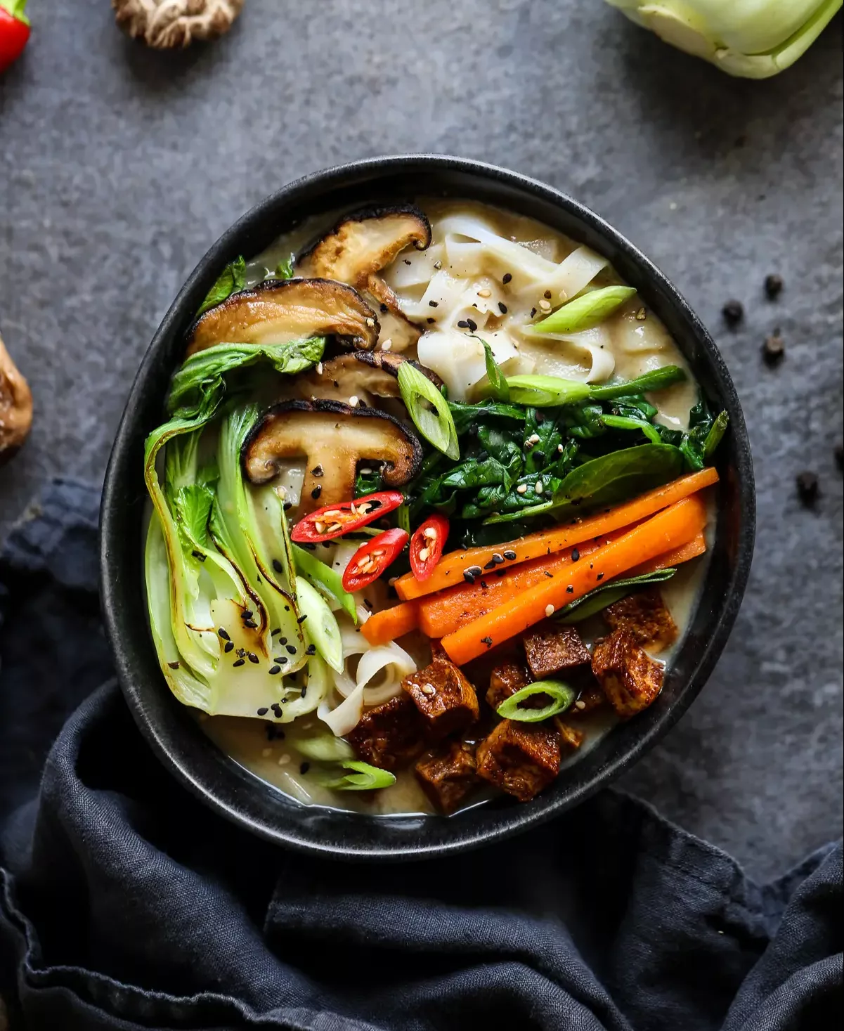 Vegetarian-Ramen-in-a-Black-Bowl-with-Ingredient-Props.jpg