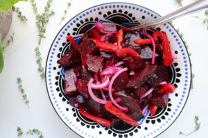 Pickled Beet Salad in bowl with spoon