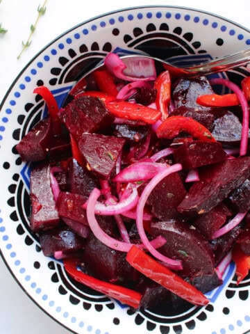 Pickled Beet Salad in bowl with spoon