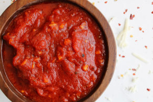 pizza sauce from tomato paste close up