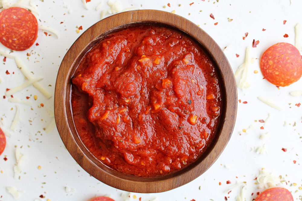 pizza sauce from tomato paste in a wood bowl