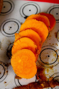 How-to-roast-sweet-potatoes-in-the-oven-vertical-view-sliced