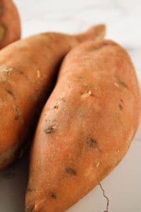 how-to-roast-sweet-potatoes-in-the-oven-raw-vertical