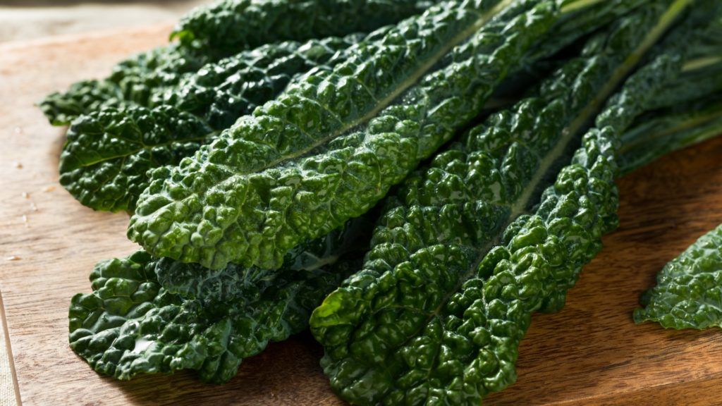 Cavolo Nero on a wood cutting board broccoli rabe substitutions