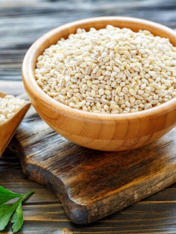 Barley grains in a wooden bowl