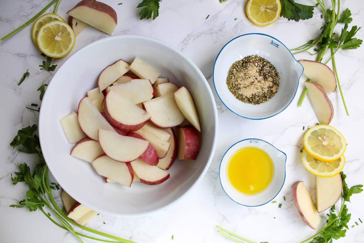 ingredients for air fryer red potatoes including oil and spices